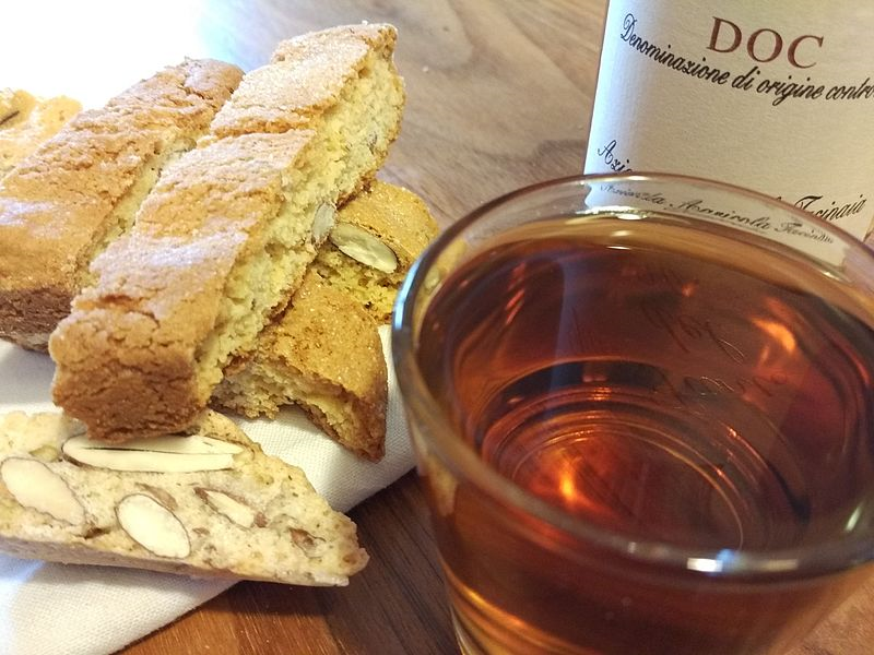 vin santo, on a plate with Cantuccini biscuits