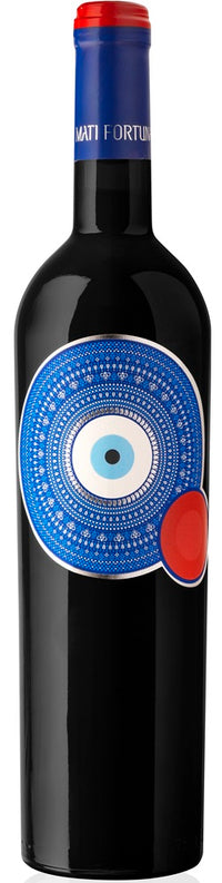Thumbnail for A bottle of red wine with a black glass body, a blue foil neck wrap with the brand name 'MATI FORTUNO', and a large circular blue and white label featuring an eye motif with a red accent.